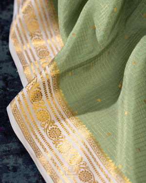 Pure mysore crepe silk saree in a beautiful shade of green and off white