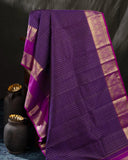 Deep purple Kanchipattu saree with contrast magenta gap border