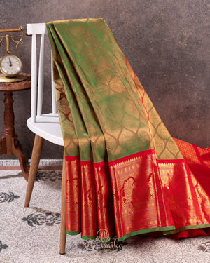 Royal Gadwal Pattu saree in a beautiful olive green and red combination