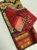 A classic kanchi kalamkari saree with a pure Patola blouse