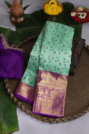 Mint Green Kanjeevaram saree with a purple border