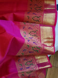 Kanjeevaram in a beautiful shade of majenta with a woven paithani styled border