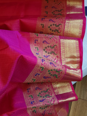 Kanjeevaram in a beautiful shade of majenta with a woven paithani styled border