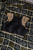 Black Bandini Gharchola saree with a showstopper blouse patter