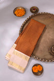 A beautiful vintage kanjeevaram in coppery rust with an ivory border