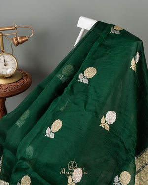 Banarasi Organza Saree in dark green with a floral blouse