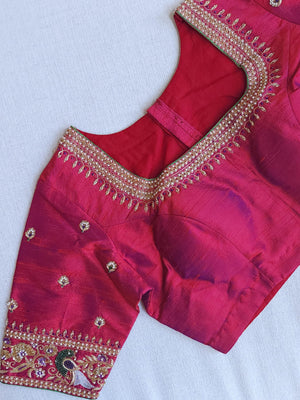 A Royal Gadwal kanchi saree in purple with contrast turning meena border