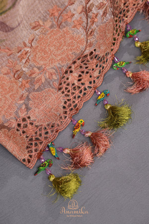 Crushed tissue saree in peach with beautiful cutwork border