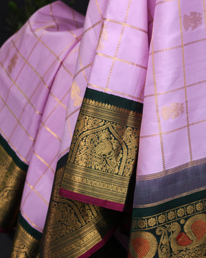 Gadwal kanchi saree in a beautiful lavender and emerald green combo
