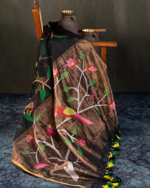 Muslin jamdaani saree in black with all over floral weave