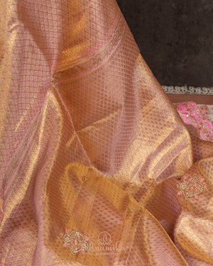 Gold kanjeevaram with contrast pink border and maggam work border