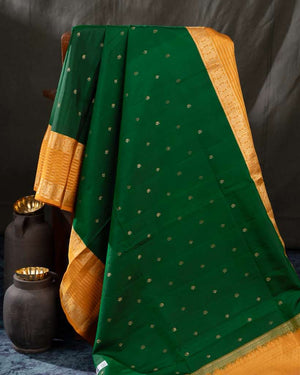 Kanchi soft silk saree in an evergreen green and light orange combo