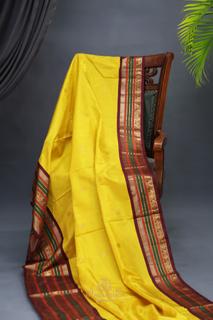 Gadwal Pattu saree in yellow and brown