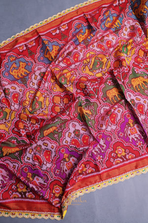 Patan Patola saree with intricately designed maggam work border