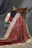Tmeless kanjeevaram in a maroon shade