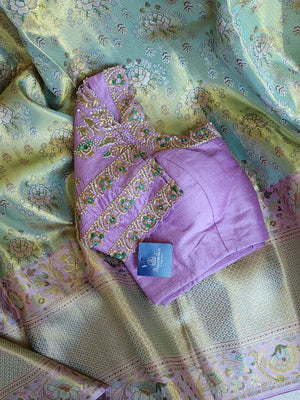 Stunning meenakari kanjeevaram in pastel green and lavender hues
