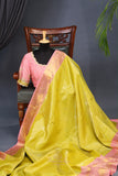 A dreamy kanjeevaram saree in a pastel lime shade