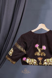 Yellow Gadwal Pattu saree with brown border and tanjore painting