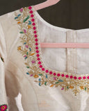Off white blouse with beautifully designed Patola-inspired embroidery