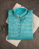 Lovely sky blue silk kurta with Zari lines and hand embroidery across the neckline.