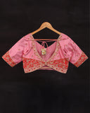 Raw Mango saree in red paired with a pink blouse