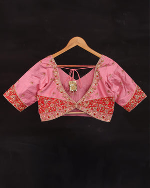 Raw Mango saree in red paired with a pink blouse