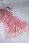 Elegant Crush Tissue saree in peach pink with a stunning mirror work blouse