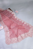 Elegant Crush Tissue saree in peach pink with a stunning mirror work blouse