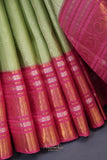 A dreamy kanjeevaram saree in a pastel green shade