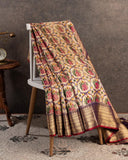 Light brown twill Patola saree with a contrast lavender border