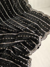 Falling organza saree in black with all over sequins work
