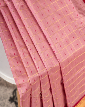 Light baby pink Kanchipattu saree with a contrast dark pink border