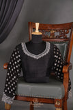 A graceful black Georgette saree with stylish full sleeves blouse