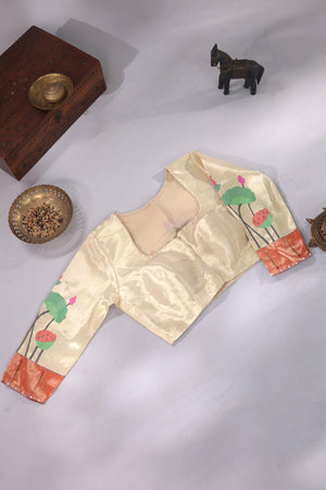 Pure paithani tissue blouse in cream with red muniya border