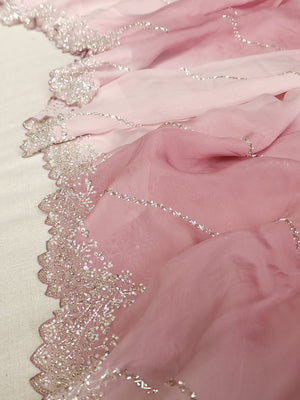 Shaded pink Georgette saree with work border