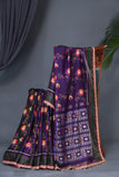 A classic patola in purple with a striking border