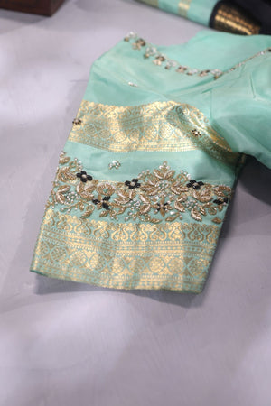 Kanjeevaram in black and sea green combination