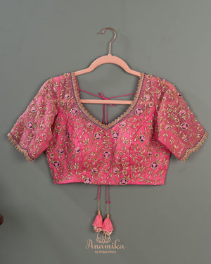 A purple kanchi soft silk saree with peach pink border