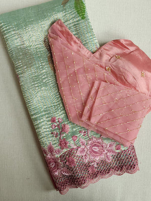Crush tissue saree in aqua green with floral cutwork border