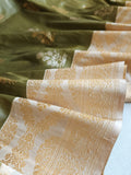 Banarasi tissue saree in a lovely sage green and ivory combo