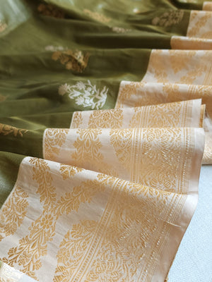 Banarasi tissue saree in a lovely sage green and ivory combo