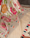 Off white Banarasi Paithani saree paired with an off white multi color thread work blouse