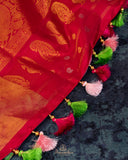 Pink Gadwal tissue saree with a contrast red border