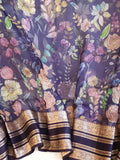 A purple Kota silk saree with beautiful floral prints