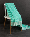 Teal green Banarasi chiffon saree with chikankari work all over