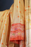 Banarasi Kora silk in a luxurious golden cream and orange border