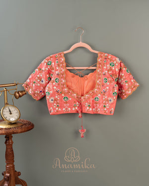 Peach Gadwal saree with peacock motifs