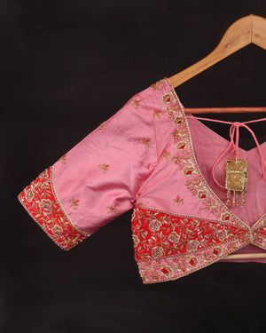 Raw Mango saree in red paired with a pink blouse