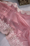 Elegant Crush Tissue saree in pink with a stunning mirror work blouse