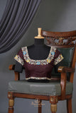 Timeless Ikkat patola elegance in rich chocolate brown
